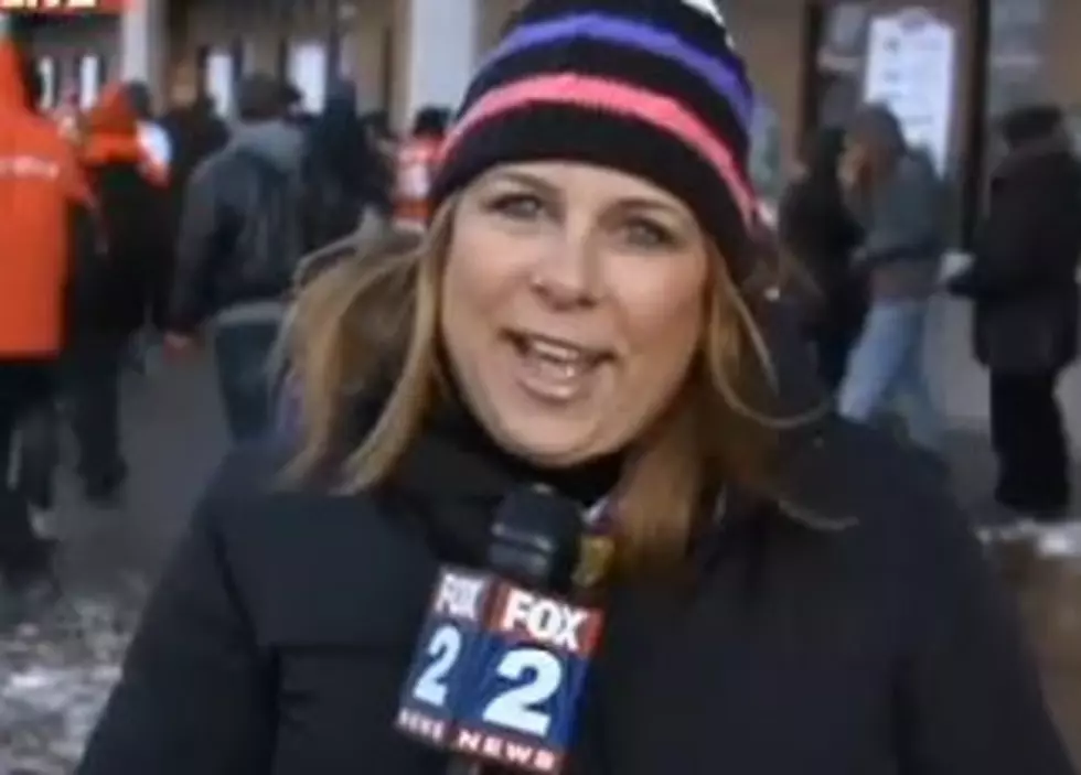 Red Wings Fan Falls While Attempting To Get On Live News [VIDEO]