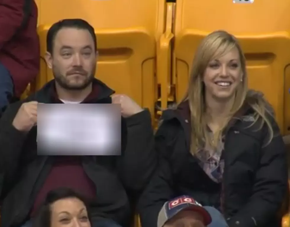 Man is Fully Prepared For Kissing Cam During Game [VIDEO]