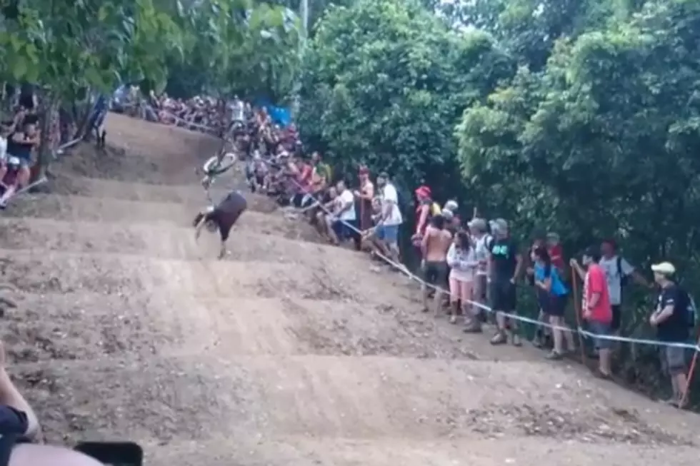 Spectator Steals Bike And Tries To Race With The Big Boys, Fails Hard [VIDEO]