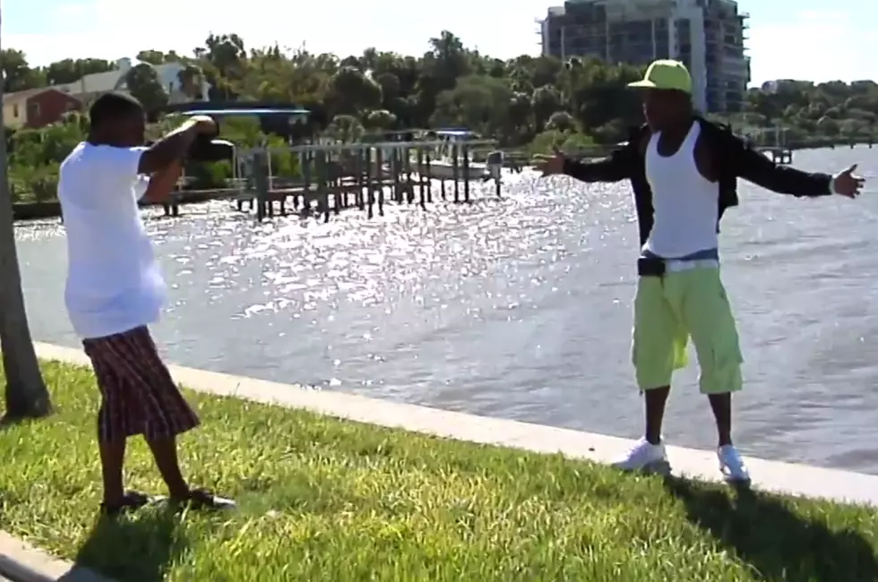 Rapper Accidentally Goes for a Swim During Photo Shoot [VIDEO]