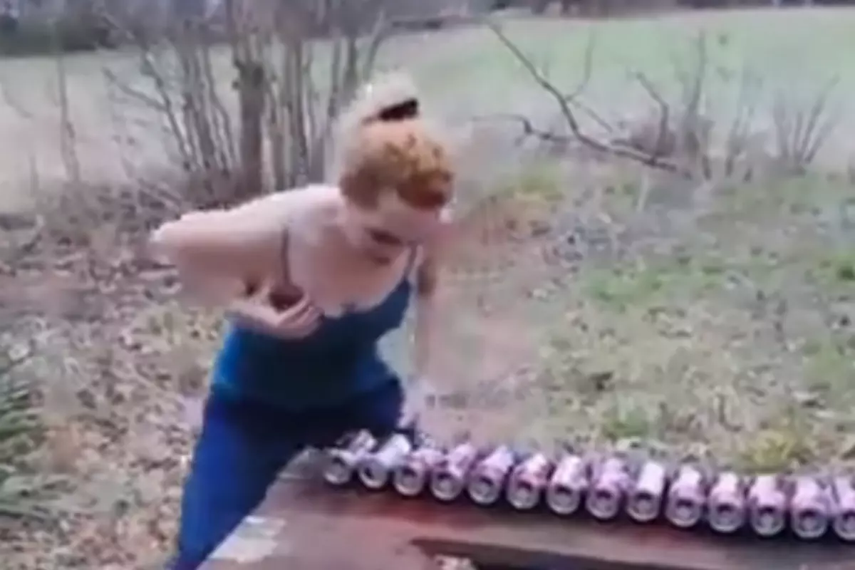 Girl Smashes Cans With Her Boobs VIDEO