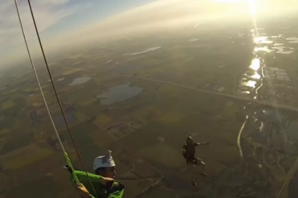 Dude Rappels Under Hot Air Balloon To Film Skydivers [VIDEO]