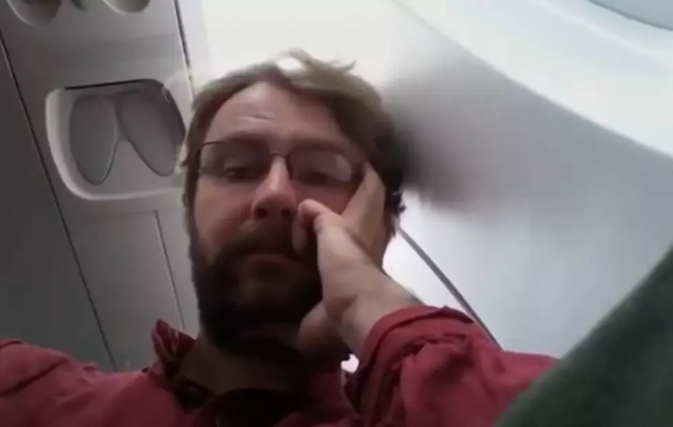 Miserable Dude Stuck On Plane With Screaming Baby [VIDEO]