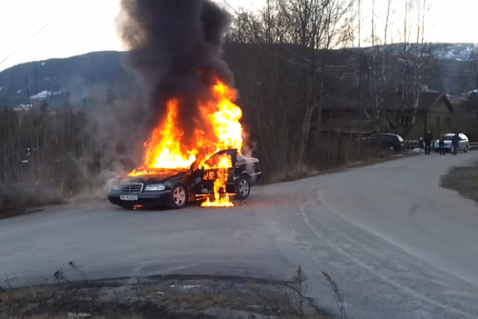 Burning Car Rolls Downhill While Firefighters Try To Put It Out [VIDEO]