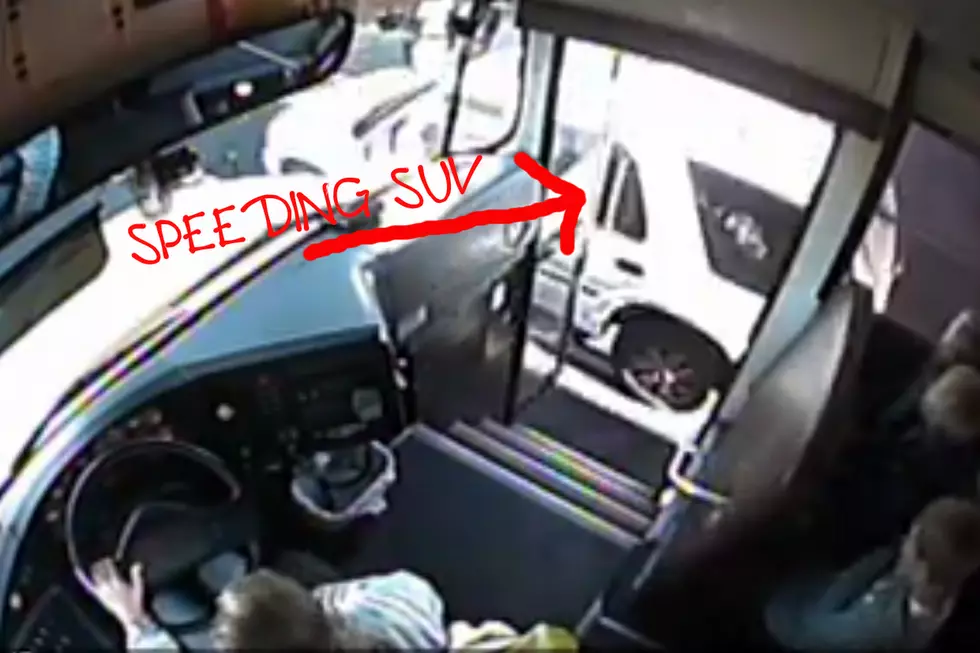 Speeding SUV Barely Misses Three Kids Getting On School Bus [VIDEO]