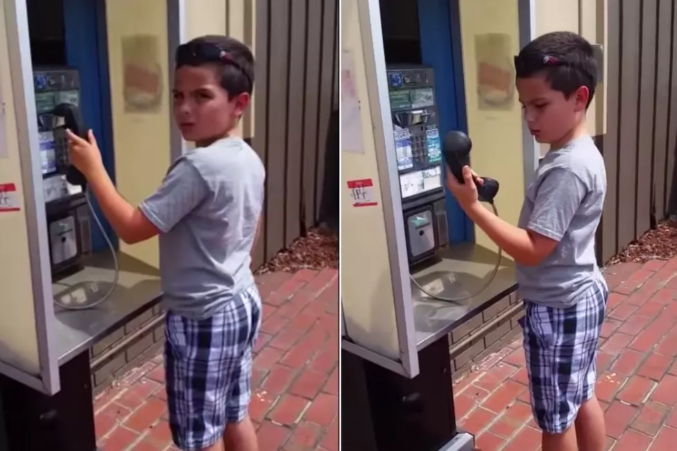 Kid Has No Idea What A Phone Booth Is [VIDEO]