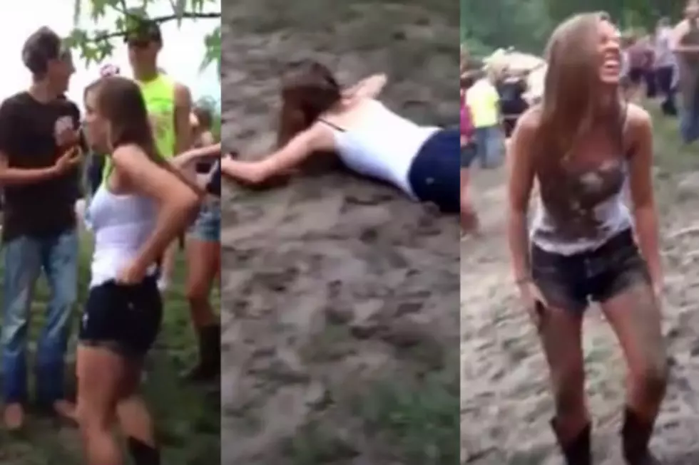 Hot Chick Tries To Slide In Mud, Fails Miserably [VIDEO]