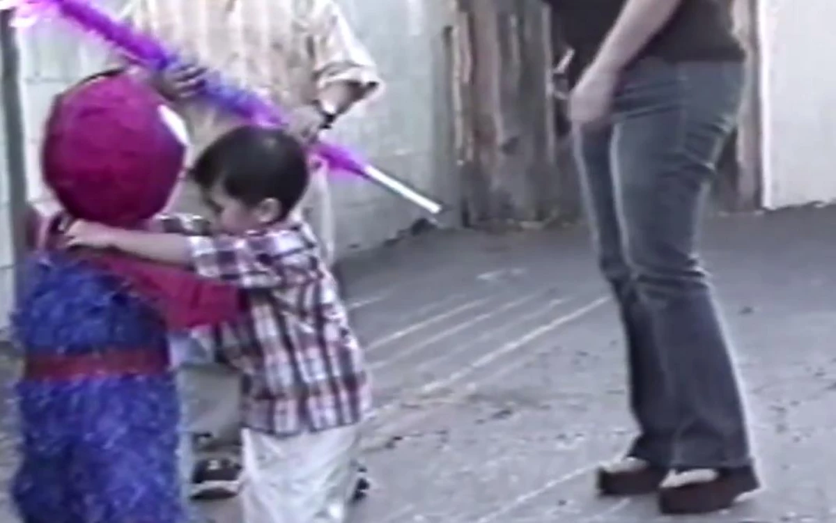 Adorable Little Boy Doesn't Want To Hit His Spiderman Pinata [VIDEO]