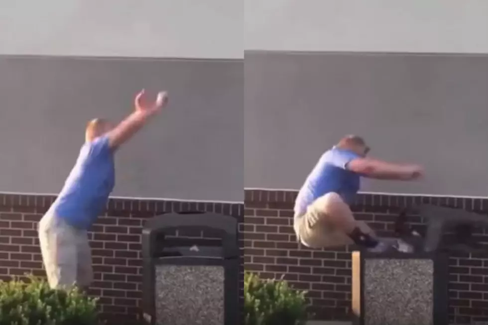 Dude Tries To Jump On Top Of A Trash Can, Fails [VIDEO]