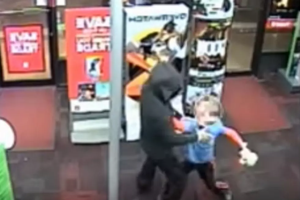 Tough Kid Tries To Fight Robbers In Video Game Store [VIDEO]