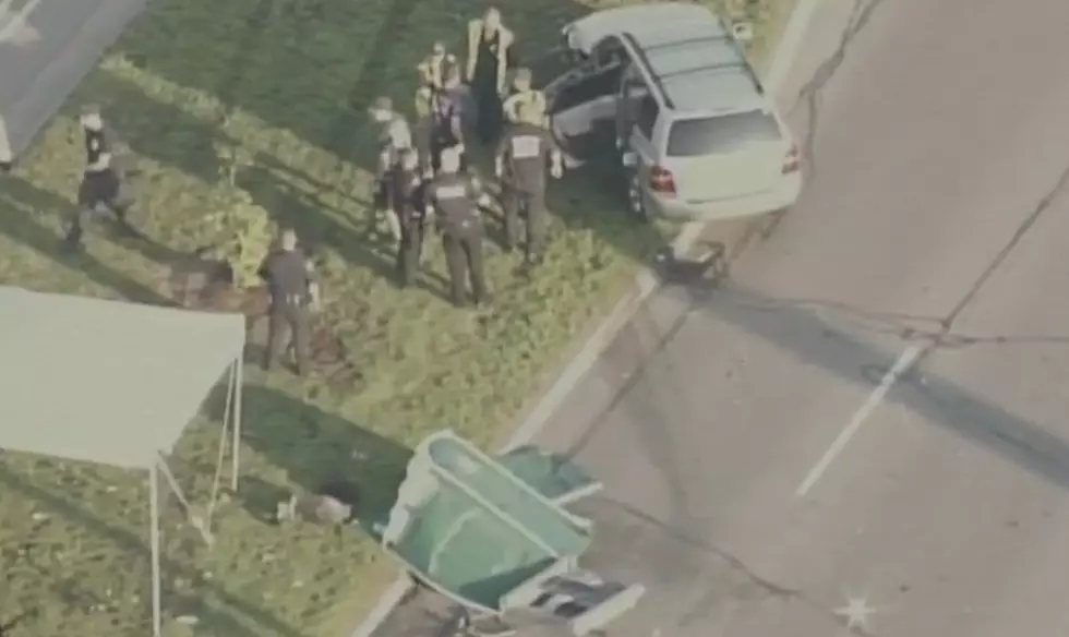 Car Crashes Into A Porta Potty on Woodward Ave in Detroit [VIDEO]