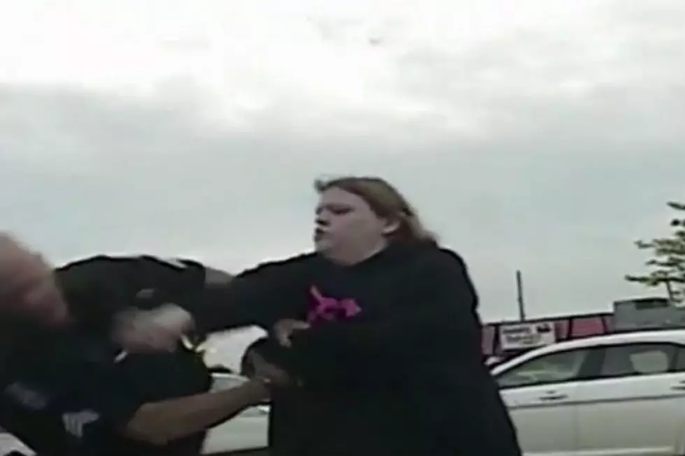 Michigan Woman Caught on Camera Sucker Punching Cop [VIDEO]
