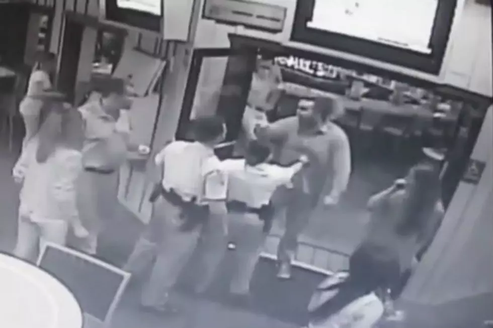 Big Angry Dude Gets Taken Down By Cop And Manager [VIDEO]