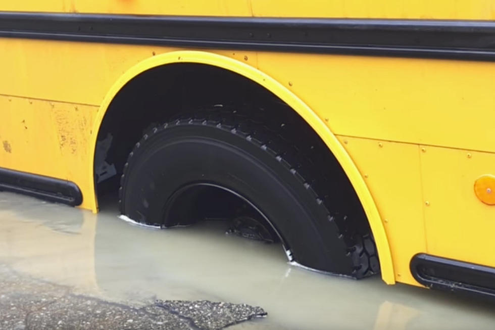 Flint School Bus Gets Stuck In Flooded Pothole [VIDEO]