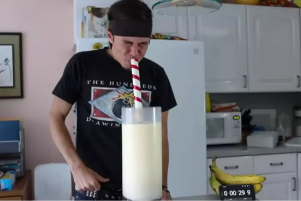 Holy Brain Freeze – Competitive Eater Sucks Down Over 10 Milkshakes In 5 Minutes [VIDEO]