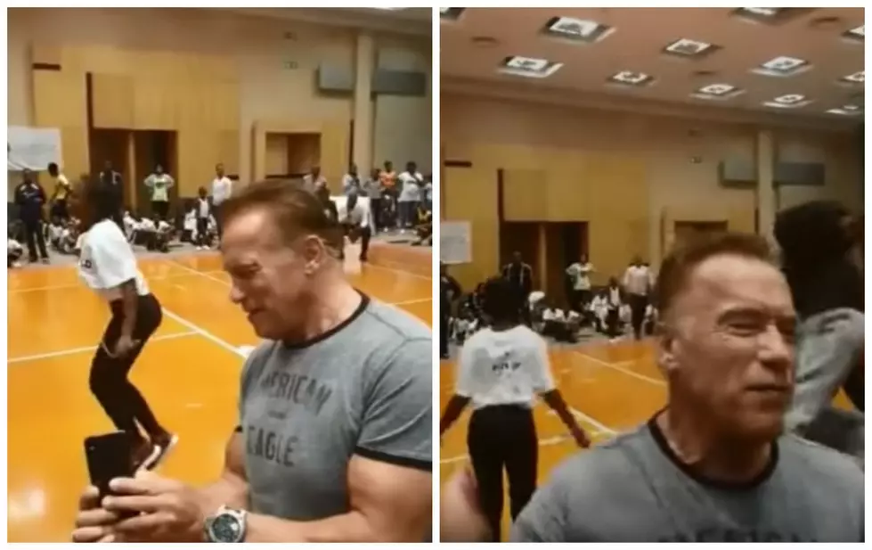 Arnold Schwarzenegger Gets Drop Kicked By Random Guy [VIDEO]