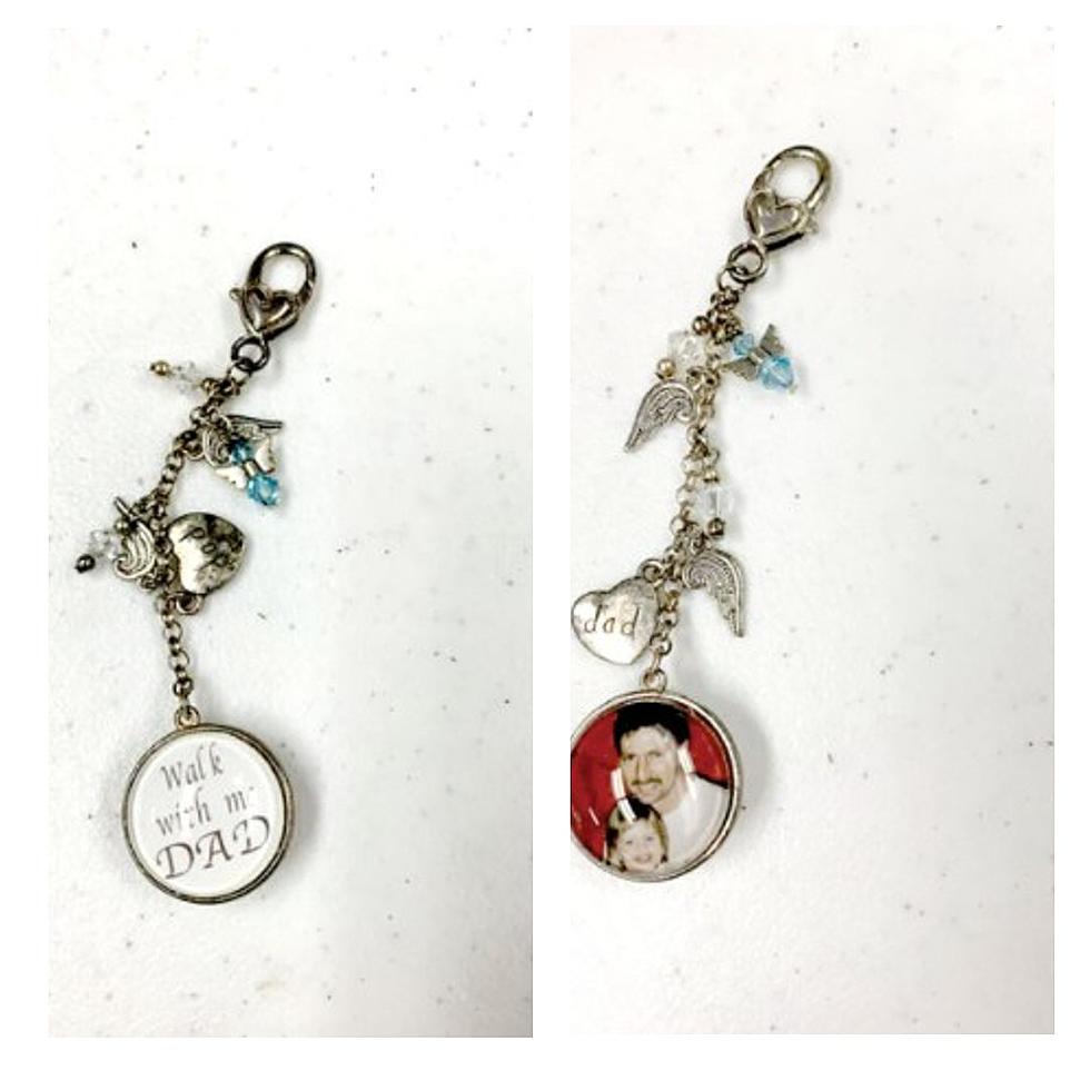 Is This Yours? Charm Found Attached To Donated Wedding Dress In Fenton