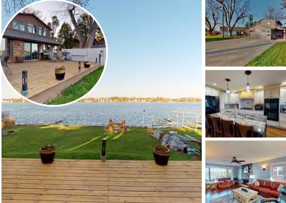 Lake Fenton Home Features Beautiful Lakefront And A Lawn