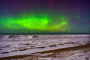 MI Man Takes Beautiful Photos of Northern Lights Over Lake Superior