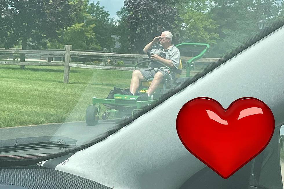 Grand Blanc Man Stops Mower to Salute Police Funeral Procession