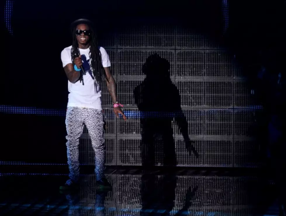 Lil Wayne Kicks Stalkers Off His Property [Video]