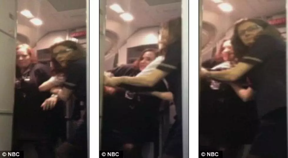 Flight Attendant Goes Crazy; Tells Passengers Plane Is Going To Crash [Video]