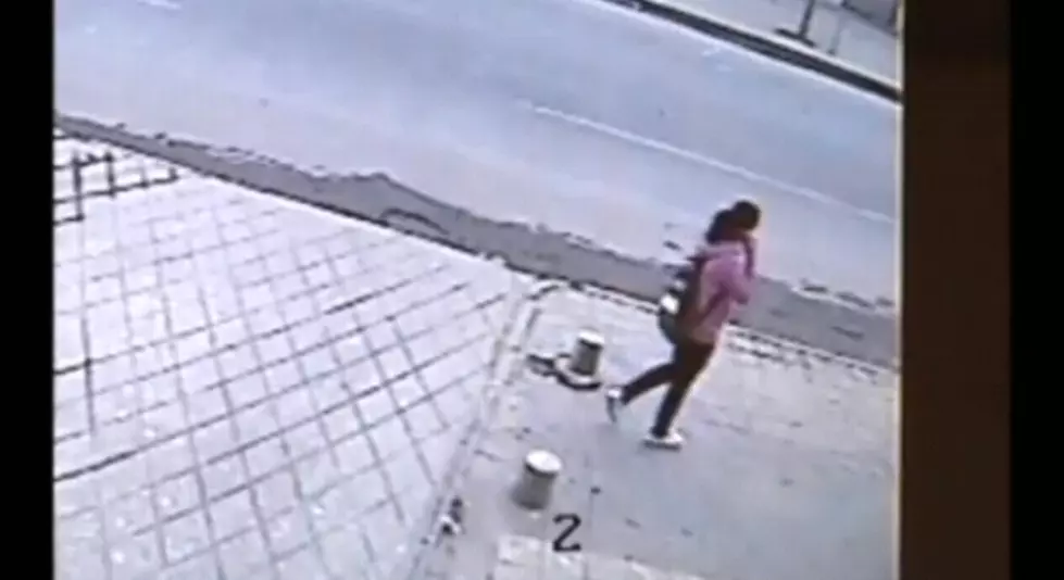 Girl Gets Swallowed By Pavement [Video]
