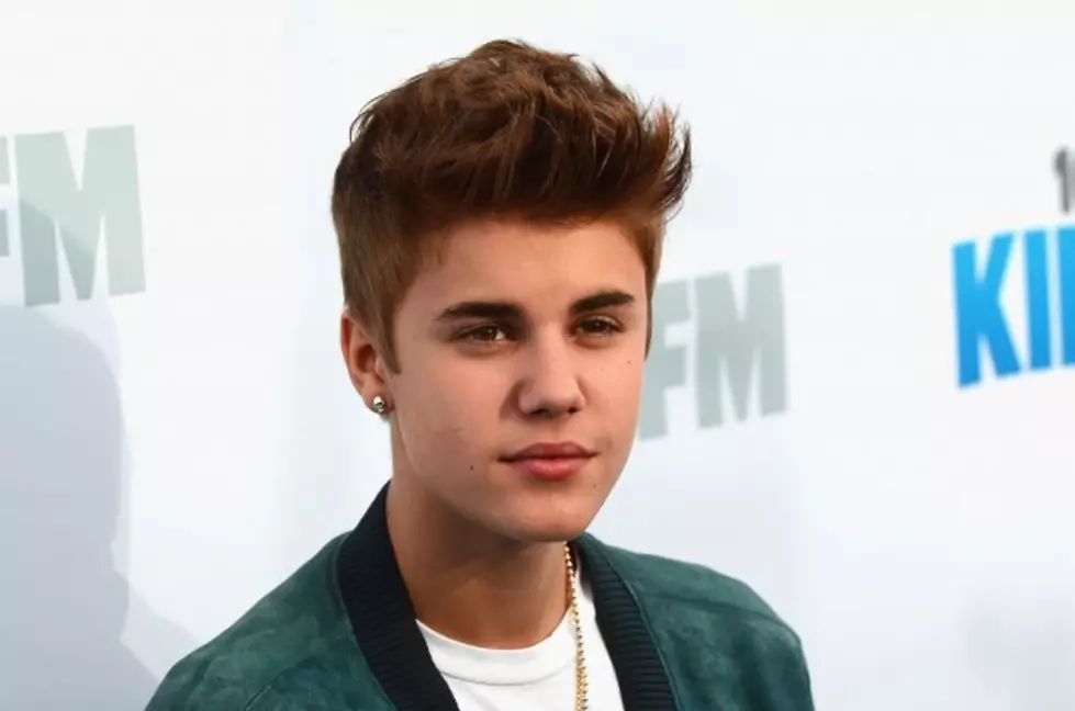 Justin Bieber Scores Street Cred After Fighting Paparazzi [Video]
