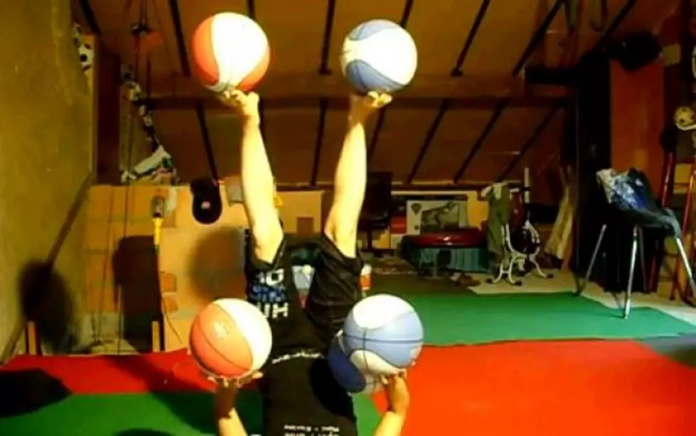 Girl Juggles Five Basketballs Upside Down With Her Feet [Video]