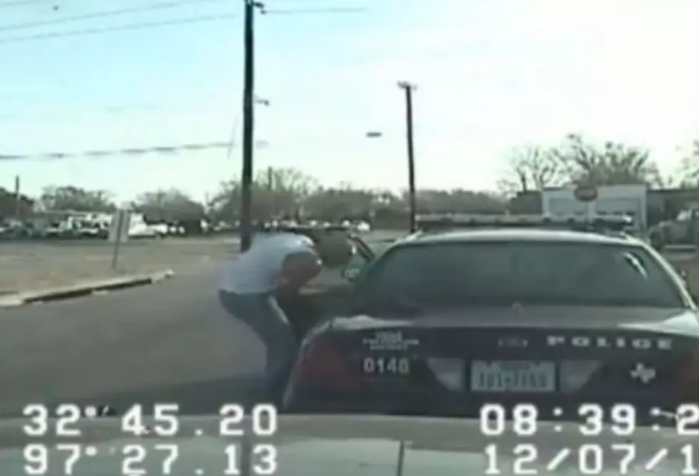 Guy Steals Cop Car While in Handcuffs [VIDEO]