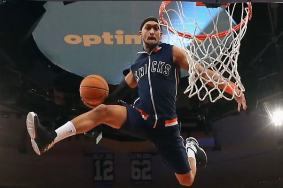Dude Dunks Himself Through The Net During Halftime Show [VIDEO]