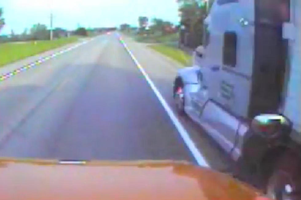 School Bus Camera Catches A Semi Nearly Hitting A Student And Bus [Video]