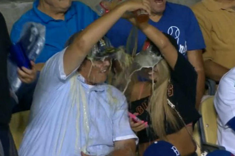 Couple Pours Beer On Each Other During Kiss Cam Moment [Video]