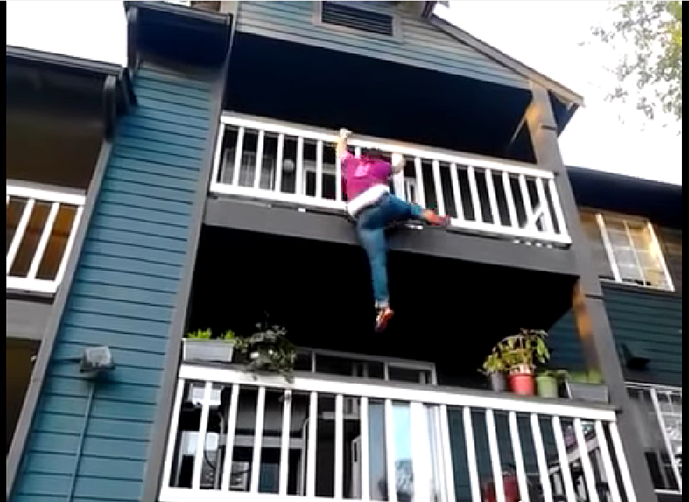 Woman Tries To Climb Down Balcony, Fails Miserably [Video]