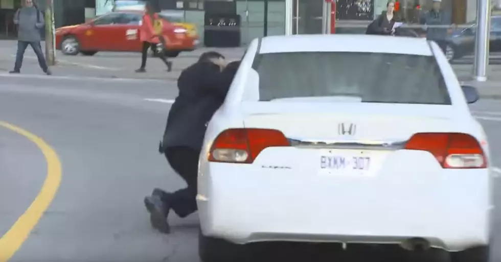 Taxi Driver Attacks Uber Driver, Gets Dragged Down Road ‘To Prove A Point’ [Video]