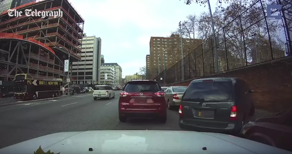 Selfish Driver Blocks Road So Family Member Can Steal Parking Space [Video]