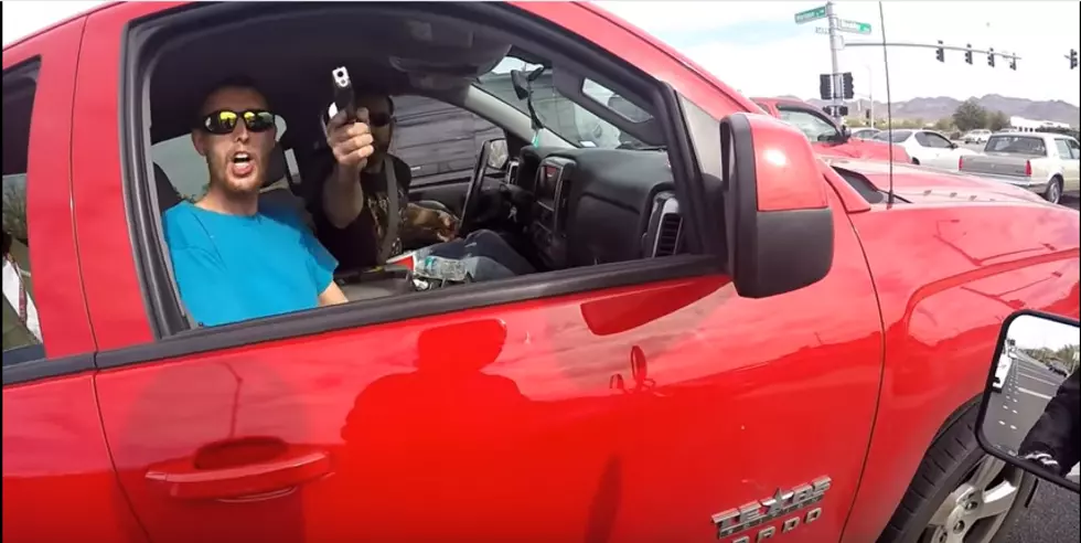 Idiot Points Gun At Motorcyclist During Road Rage Incident [Video]