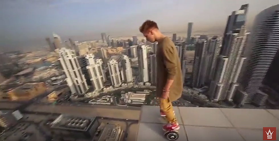 Kid Rides Hoverboard On The Edge Of Skyscraper [Video]