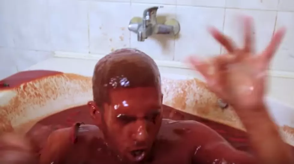 Man Bathes In A Tub Full Of 1250 Bottles Of Hot Sauce