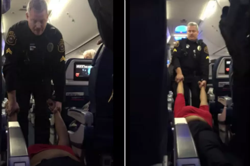 Woman Gets Dragged Off Delta Flight In Detroit After Storming Past Gate Agent [Video]