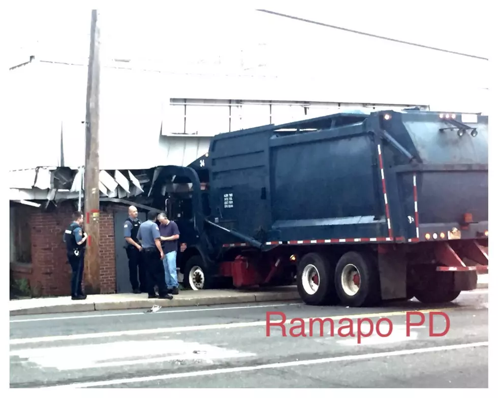 Garbage Truck Crashes into Vehicle Then Building (Photos)