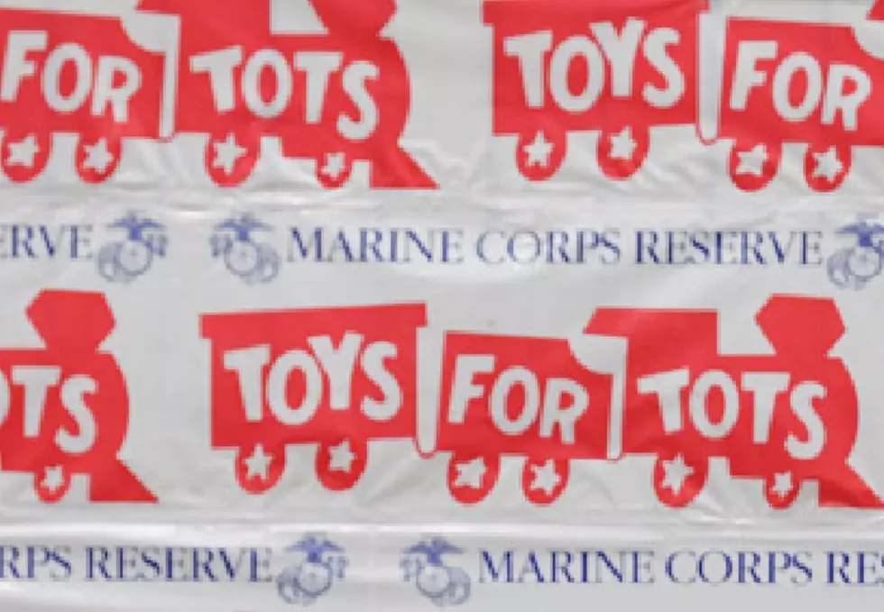 Toys For Tots Handing Out Christmas Gifts