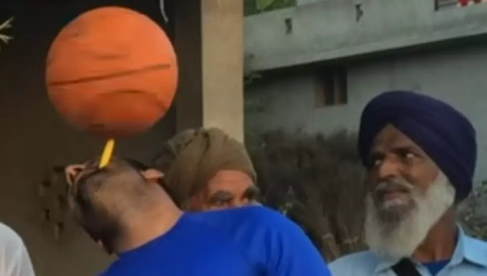 Man Combines Toothbrush And Basketball To Break Record [VIDEO]
