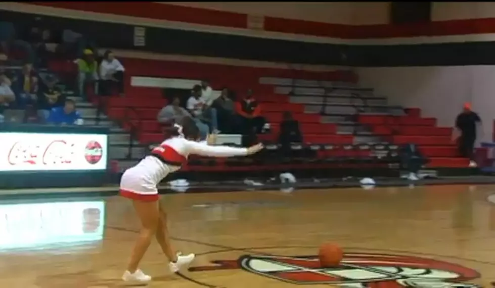 Cheerleader Makes Half Court Trick Shot…Unreal! [VIDEO]