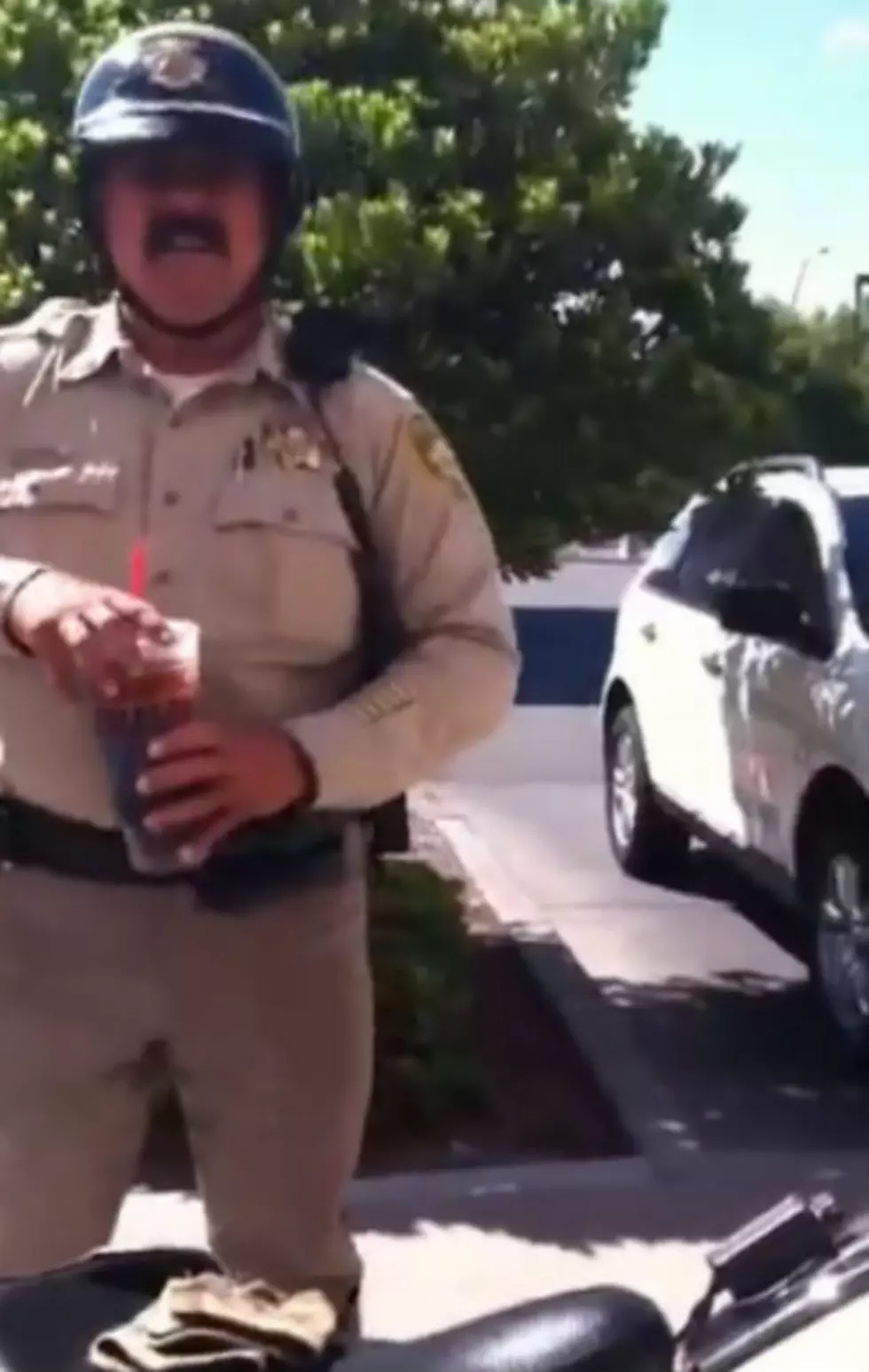 Watch This 12 Year – Old Call Out A Cop For Parking Illegally To Get A Pop [ Video]