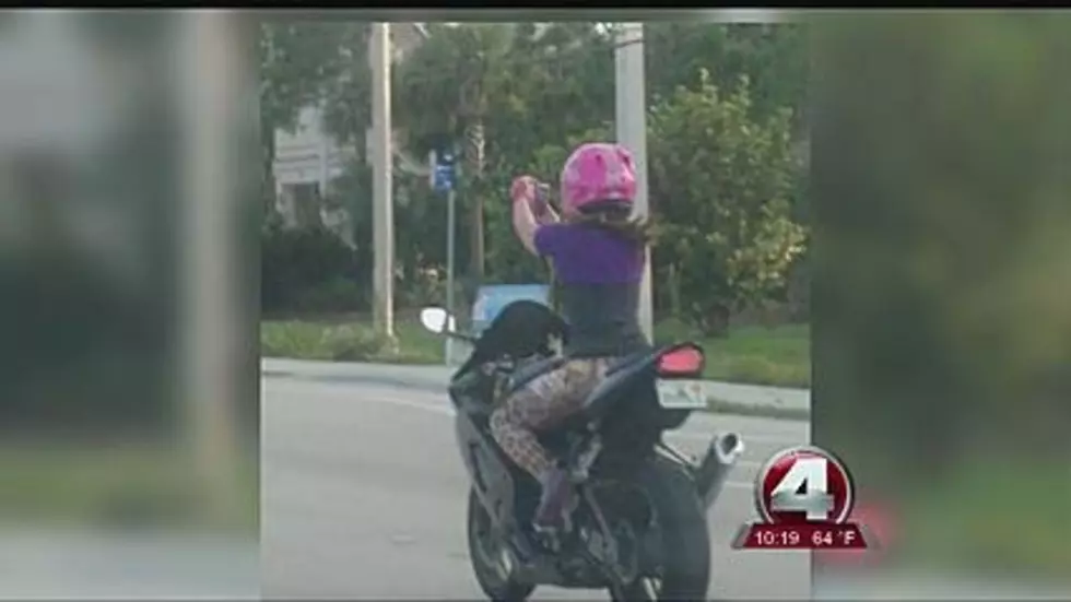 Caught On Video! Girl Taking &#8216;Selfie&#8217; While Driving Motorcycle [VIDEO]
