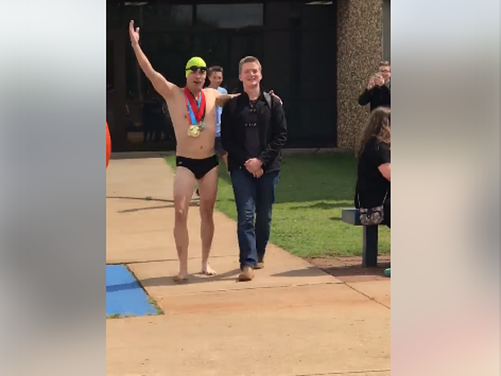 Watch This Dad Pick Up His Teen From School…In a Speedo [VIDEO]
