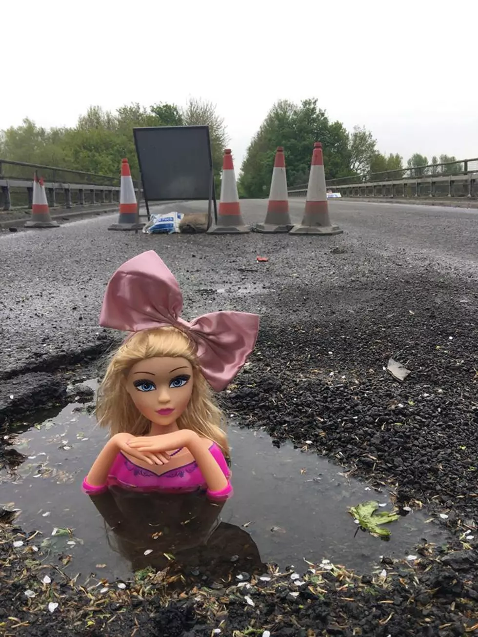 Let&#8217;s Do This in Michigan &#8211; A Guy Put Dolls in Bad Potholes in the UK [PHOTOS]