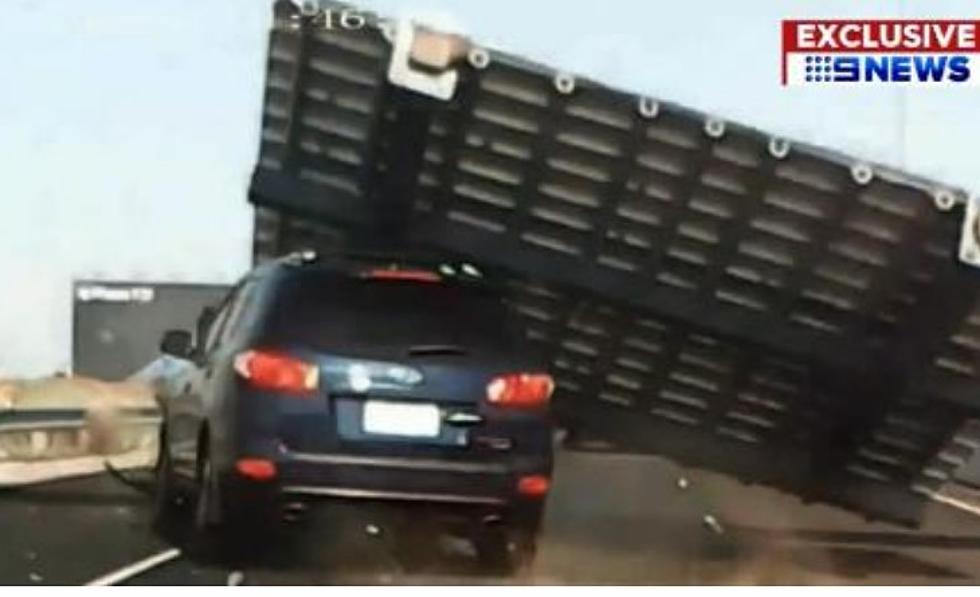 OMG! Huge Freeway Sign Falls, Hits Car, And The Driver Lived [VIDEO]