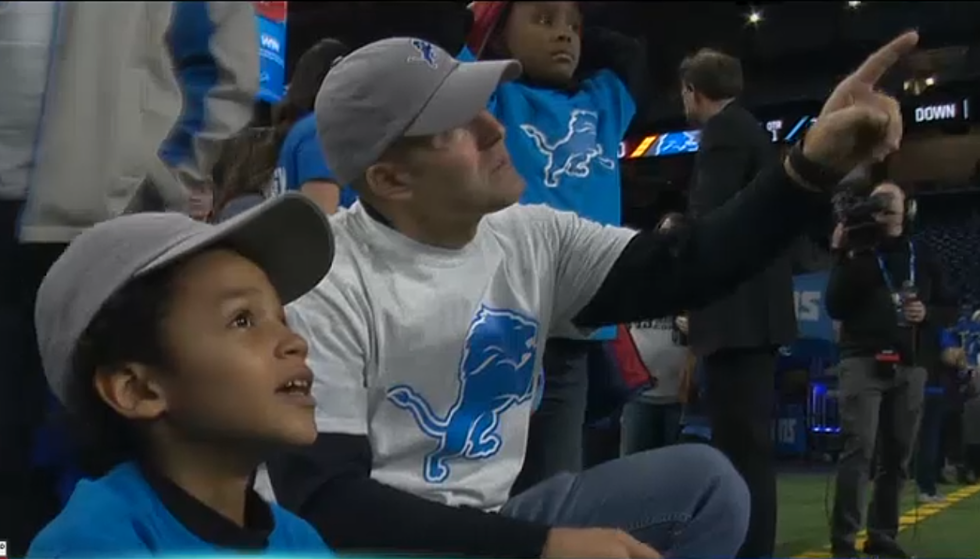 Local Police Take Kids from Shelter of Flint to Lions Game